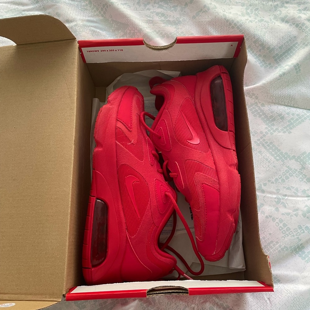 Red Nike huraches, these are an older version, still in great condition